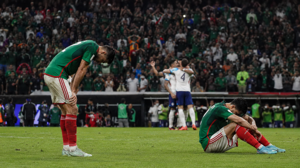 Mexico fans react after El Tri’s 3–2 World Cup loss to England at Estadio Azteca.
